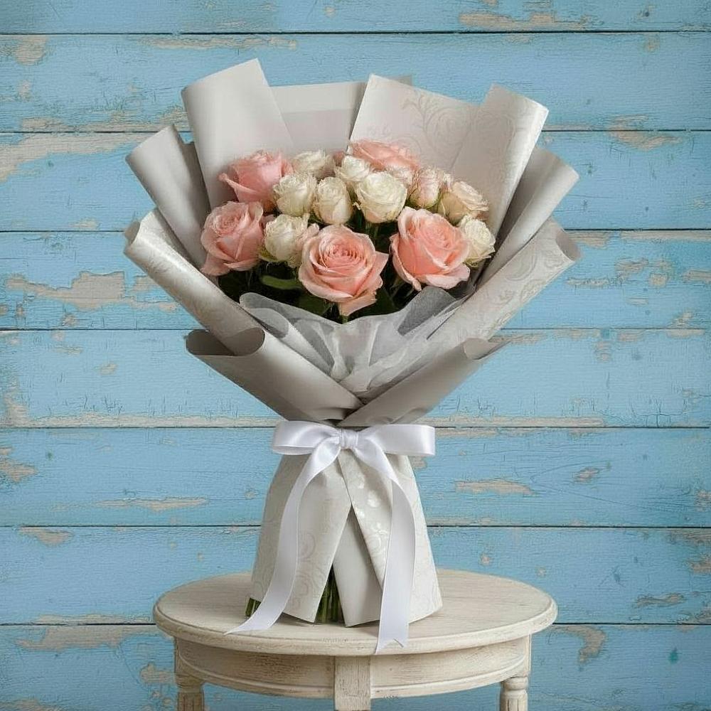 Букет цветов из: Розы в Атиге